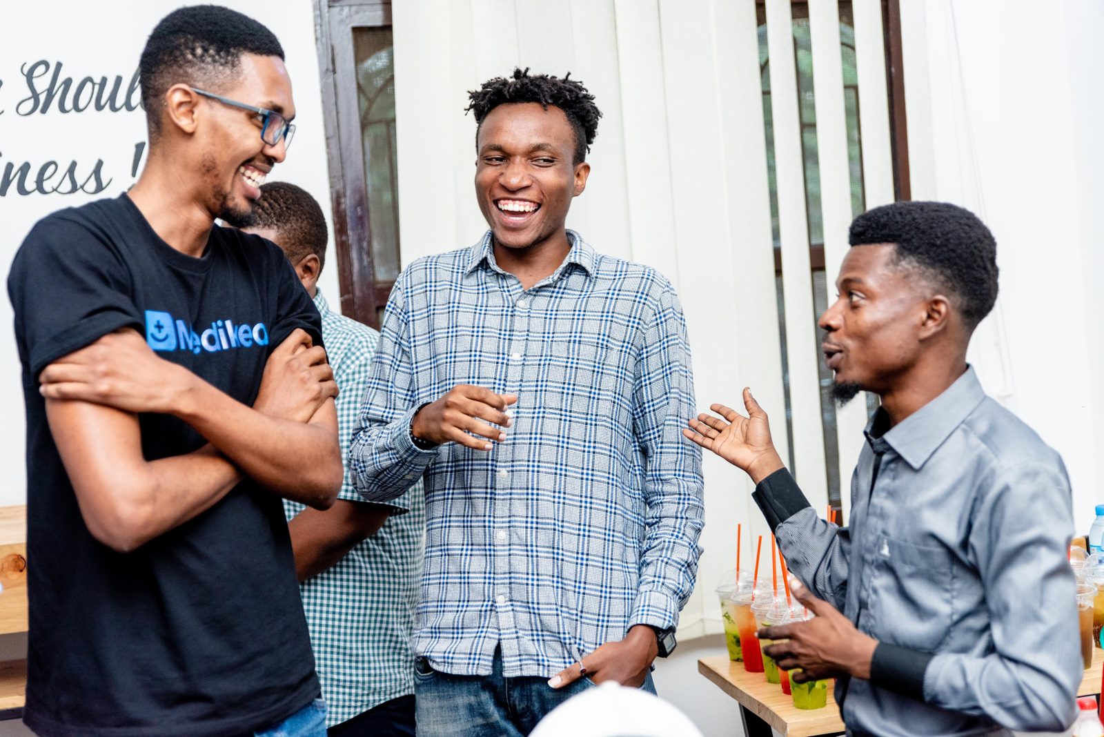 Startup founders in conversation at a community event